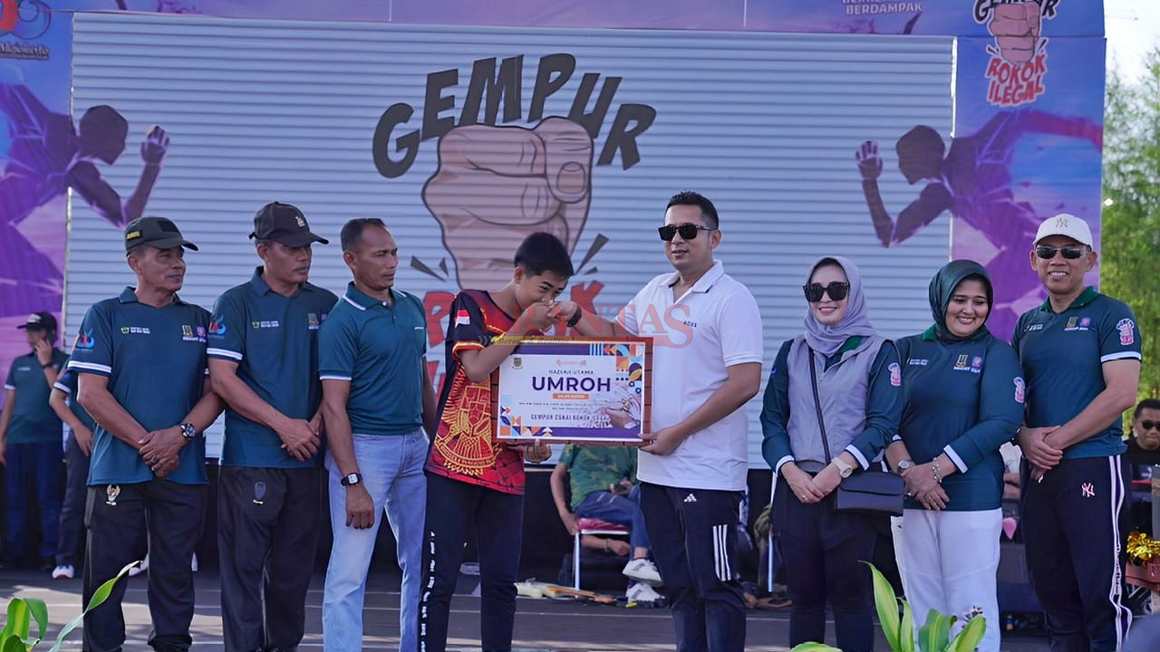 Sambut HUT ke - 106 Kota Mojokerto Satpol PP Gelar Jalan Sehat Sosialisasi Gempur Rokok Ilegal Door Prize Hadiah Umroh